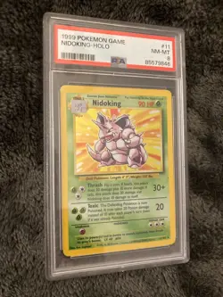 1999 Pokemon Game 11 Nidoking-Holo (PSA 8) - Image 1
