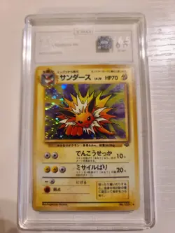 Pokemon TCG Jolteon #135 Japanese Jungle Unlimited Holo Rare 1998 TAG 6.5 SWIRL - Image 1