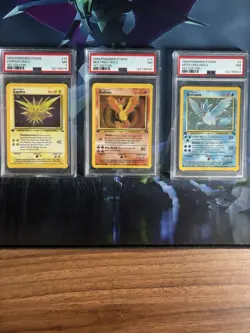 Pokemon TCG - TRIO - 1st Edition Moltres Zapdos & Articuno Fossil Set - PSA 7 NM - Image 1