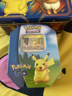 One Factory Sealed Pokemon TCG 2022 Collector's Tin: Pokemon Go (Pikachu Promo) - Image 1