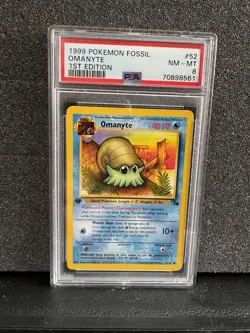Pokemon Omanyte 52/62 1st Edition Fossil Regular PSA 8 - Image 1