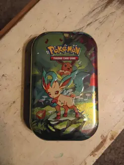 Pokemon Scarlet Violet Prismatic Evolutions Leafeon Mini Tin 2025 - Image 1
