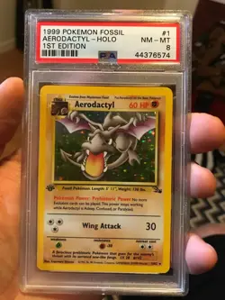 1999 Aerodactyl #1/62 Holo (1st Edition) PSA 8 Rare Pokemon Fossil WOTC - Image 1