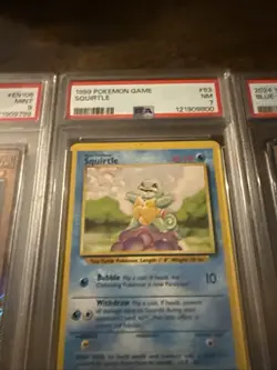 Pokemon 1999 Squirtle Base Set #63 PSA 7 - Image 1