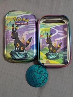 Prismatic Evolutions Umbreon *EMPTY* Mini Tin (Tin + Art Card + Coin) - Image 1