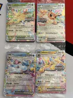 Prismatic Evolutions Surprise Box Promo Cards - 4 Stamped Ex Promo Cards - Image 1