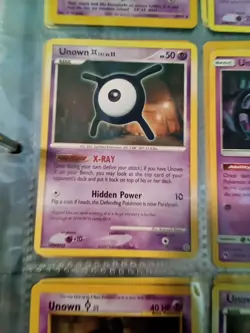 27 Assorted Unown Pokemon Cards Non Holo , Some Promos 1995-2018 Some Duplicates - Image 1