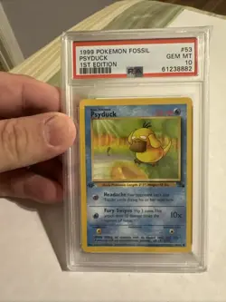 1999 POKEMON FOSSIL Psyduck 1st Edition #53/62 PSA 10 ENGLISH - Image 1