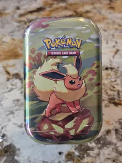 Pokemon Prismatic Evolutions SV8.5 Flareon Mini Tin Factory Sealed New - Image 1