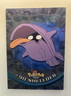 #90 Shellder Pokemon First Movie Topps Blue Label Holo Refractor - Image 1