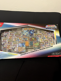 Pokemon TCG: Prismatic Evolutions Lucario and Tyranitar Premium Collection - Image 1