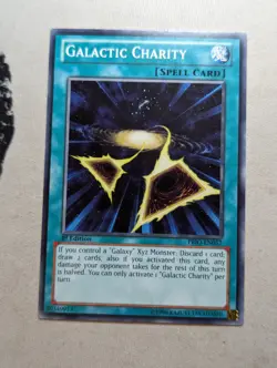 Yugioh - Galactic Charity - PRIO-EN057 - Common - 1st Edition - Image 1
