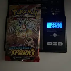 (VERY HEAVY) 22.50g Pokemon TCG Surging Sparks Booster Pack (SEALED) - Image 1