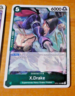 ONE PIECE ENGLISH CARD GAME HOLO CARTE X.Drake OP01-054 EN ERRATA MINT - Image 1