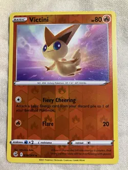 Victini 036/264 Swsh08: Fusion Strike Reverse Holo Pokemon (NM) - Image 1