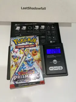 Heavy Pokemon Prismatic Evolutions Booster Pack -22.9g- Possible Demi/God Pack! - Image 1