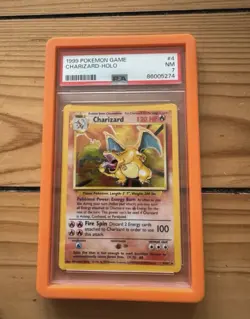 Charizard Holo PSA 7 004/102 Base Set Pokemon Card WOTC 1999 - Image 1