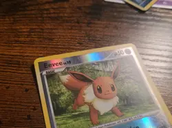 Pokemon Eevee 59/111 Rising Rivals Reverse Holo LP - Image 2