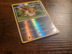 Pokemon Eevee 59/111 Rising Rivals Reverse Holo LP - Image 3