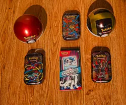 TCG Pokemon Lot Two Pokemon Balls and Chien Pao and Three Mini Tins SEALED - Image 1