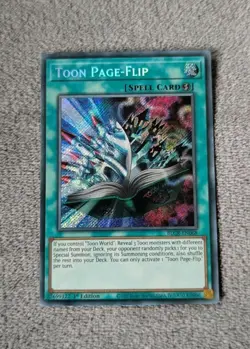 Toon Page-Flip - Secret Rare 1st Edition BLCR-EN068 - NM - YuGiOh - Image 1