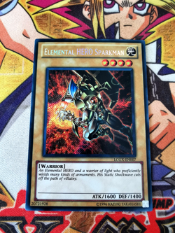 Elemental HERO Sparkman lcgx-en007 Unltd Ed (NM+) Secret Rare Yu-Gi-Oh! - Image 1