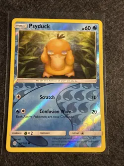 Psyduck 40/236 Cosmic Eclipse Sun & Moon Reverse Holo Pokemon TCG - Image 1