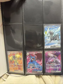 Couple Binder Pages With Pokemon Cards - Image 1
