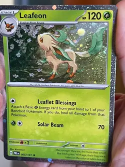 POKEMON LEAFEON 005/131 RARE COSMOS HOLOFOIL WITH SWIRL PRISMATIC EVOLUTIONS NM - Image 1
