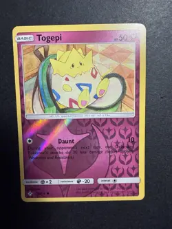 Pokemon TCG Togepi 136/214 Reverse Holo Unbroken Bonds Near Mint - Image 1