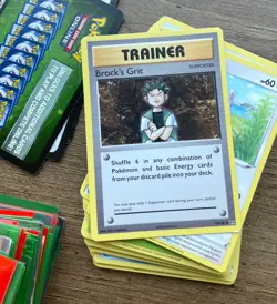 Pokemon Trading Game Tin- Mix Lot Cards 400+ , 100+ Sleeves, Manual, & Tin - Image 2