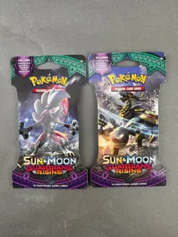Lot of 2 Pokemon TCG Sun and Moon Guardians Rising Sleeved Booster Pack - Image 1