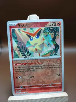 PACK FRESH Pokemon Near Mint Surging Sparks Reverse Holo Victini 021/191 - Image 1