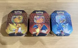 Pokemon Hidden Fates GX Tins Art Set of 3 Full Sealed Charizard Raichu Gyarados - Image 1