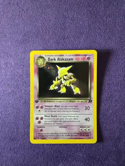 Pokemon TCG Dark Alakazam 1st Edition Rare Holo Card #1/82 Team Rocket - Image 1