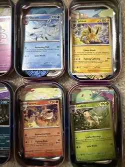 8 EMPTY Pokemon PRISMATIC EVOLUTIONS Mini Tins + Coins + Art Cards+ Bonus Promos - Image 4
