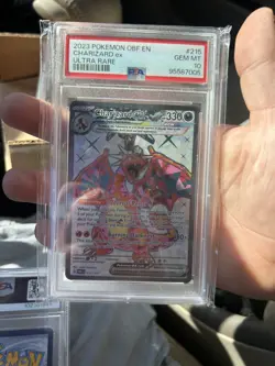 PSA 10 Charizard ex 215/197 Obsidian Flames Holo Pokemon Card - Image 1