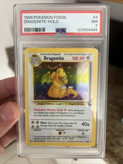 1999 Fossil Dragonite Holo Unlimited PSA 7 Pokemon Card 4/62 - Image 1