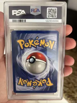 1999 Fossil Dragonite Holo Unlimited PSA 7 Pokemon Card 4/62 - Image 2