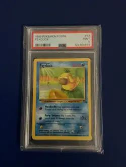1999 Pokemon Fossil Psyduck PSA 9 - Image 1