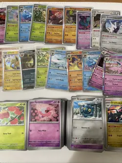 Pokemon Prismatic Evolutions Bulk Lot 200 Cards + 18 Holos - Image 1