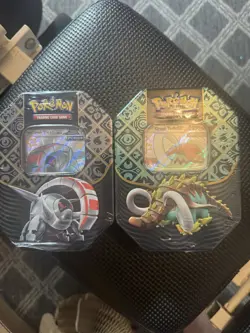 Pokemon TCG: SEALED Paldean Fates Tin Set of 2 (Iron Treads EX & Great Tusk EX) - Image 1