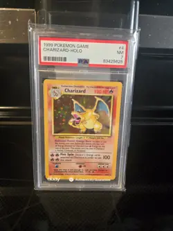 1999 Pokemon Base Set Charizard-Holo Card PSA 7 - Image 1