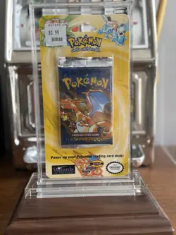 Pokemon 1st Edition Shadowless Charizard Base Set Blister Booster Pack - Sealed - Image 1