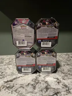 Pokemon TCG: Paldean Fates Charizard EX Tin x3 + Heros V Tin - Image 2