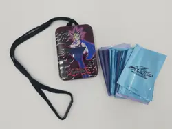 Vintage 1996 Kazuki Takahashi Yu-Gi-Oh Tin and 5o Trading Card Sleeves - Image 1