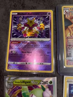 Mixed Lot Of 12 Pokemon Cards Charizard Radiant Alakazam - Image 3