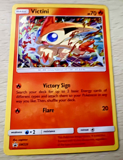 Pokemon TCG Victini SM225 Sun & Moon Black Star Promo Holo Card - Image 1