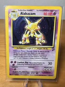 Pokemon TCG Alakazam Base Set 2 1/130 WOTC Vintage Unlimited Holo Swirl - Image 1