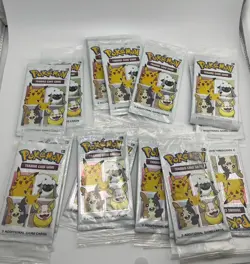 LOT 10 - SEALED 25TH ANNIVERSARY POKEMON CINNAMON TOAST CRUNCH CEREAL CARD PACKS - Image 1
